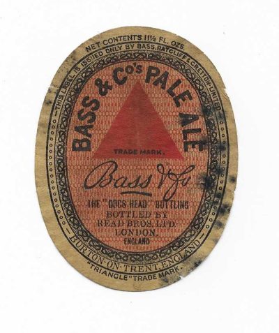 BASS - THE ' DOGS HEAD ' BOTTLING - READ BROS. - 83mm TALL - FAIR ONLY BUT SCARCE